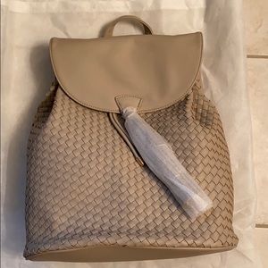 Cream/taupe drawstring ladies backpack bag